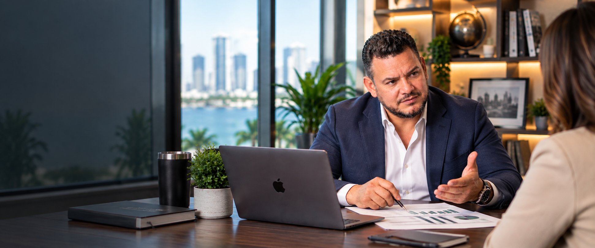 Rafael Quezada, EA, meeting with a client at Castle Rock Tax Solutions in Miami
