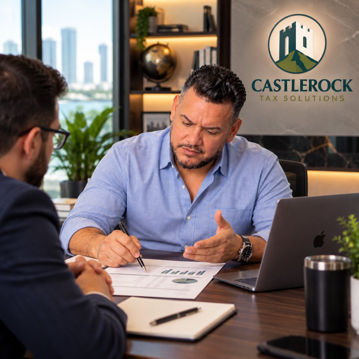 Rafael Quezada walking a client through a tax strategy